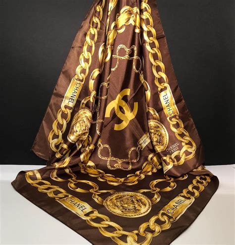 vintage chanel silk scarf with emblems|Chanel black and gold scarf.